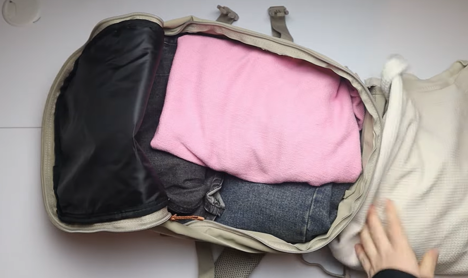 Cabin Max Metz Stowaway 20L Travel Bag packed to 70% capacity, showing organized interior layout, suitcase-style opening, and lightweight underseat design.